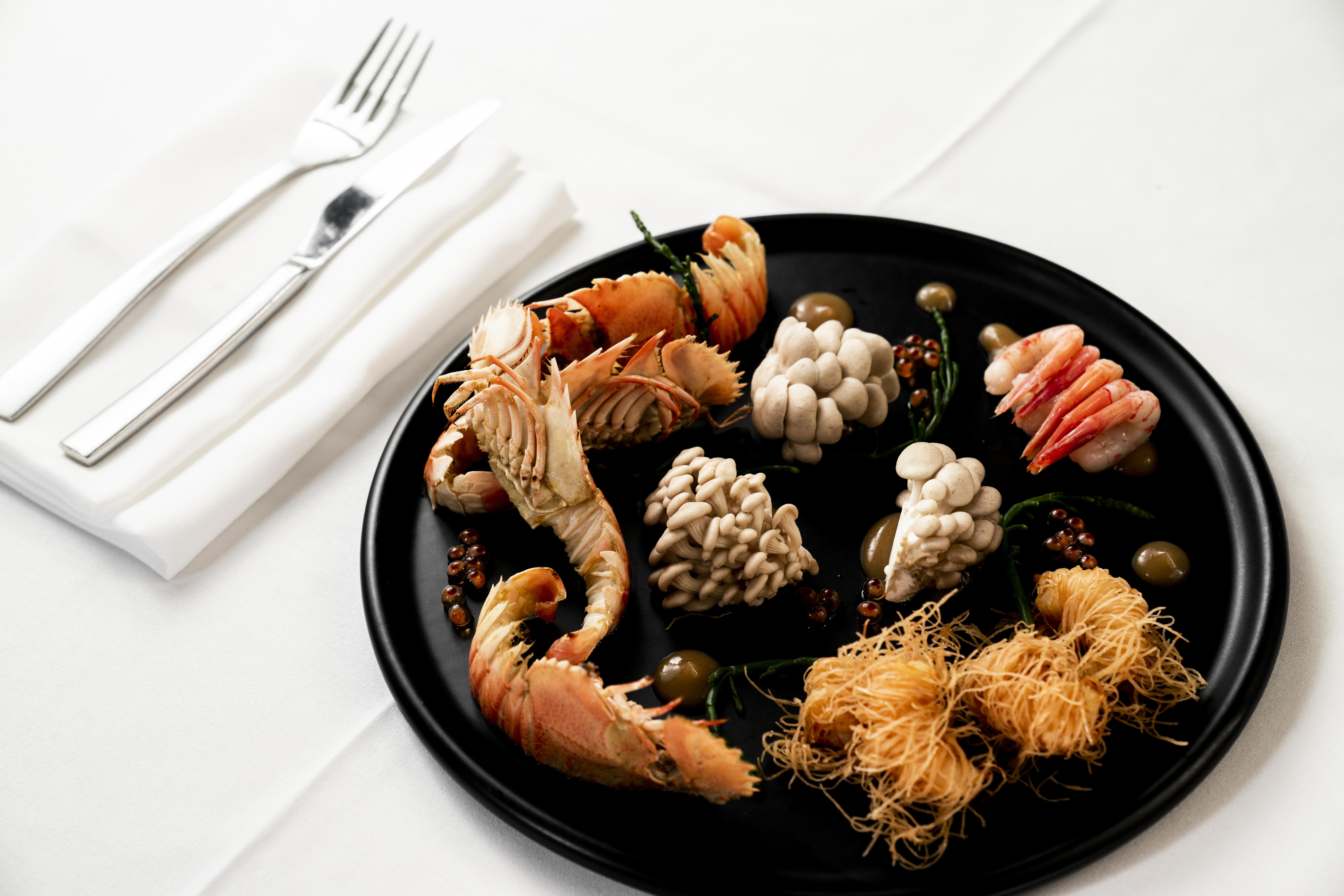 โรงแรมเดอะพอยท์บริสเบน ภายนอก รูปภาพ A seafood platter